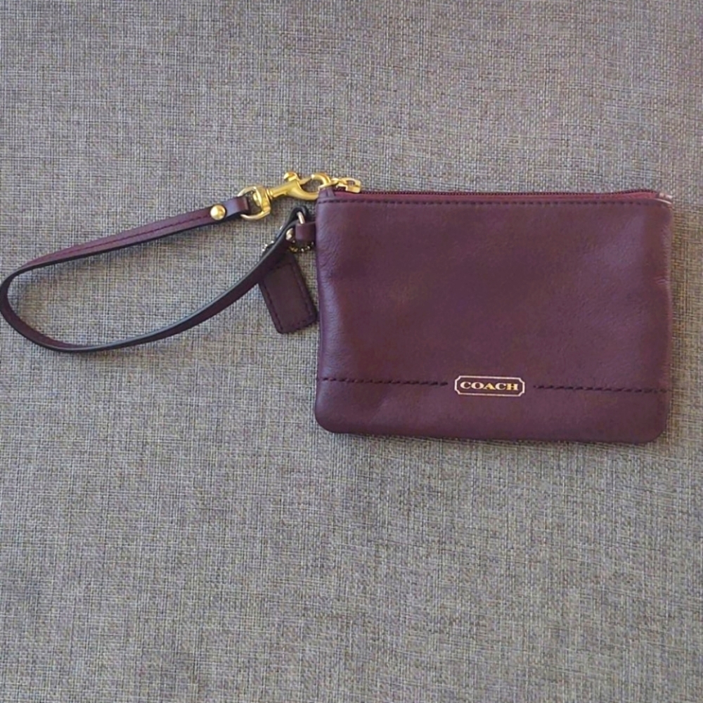 Coach Purple Leather wristlet with Gold Zipper